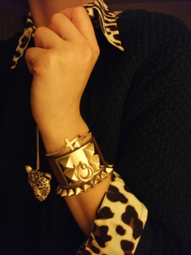 accessories -leopard pendant, bracelets - gold cross, arrow, leather cuff, gold studs