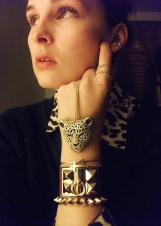 leopard necklace, vintage arrow bangle, cross chain, faux- hermes leather cuff, studded bracelet wearing maybelline great lash lots of lashes